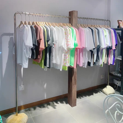 服装店展示架不锈钢落地式木头石头底座网红陈列架子儿童中岛货架