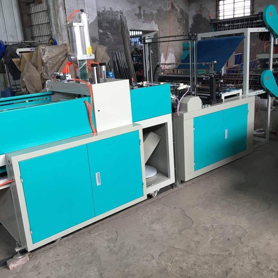 大量供应全自动塑料背心袋机器WT-700型电脑热封四道冷切制袋机