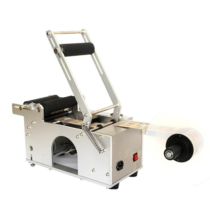 不干胶小型手持半自动圆瓶贴标机 手动玻璃瓶标签机贴商标机器