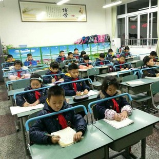 防近视坐姿矫正器视力保护器小学生用仪纠正儿童写字姿势桌面支架