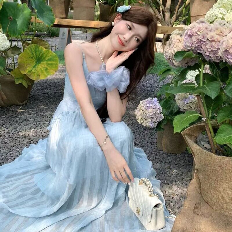 蓝色无袖吊带连衣裙子女夏季2025新款法式高级感海边度假沙滩长裙