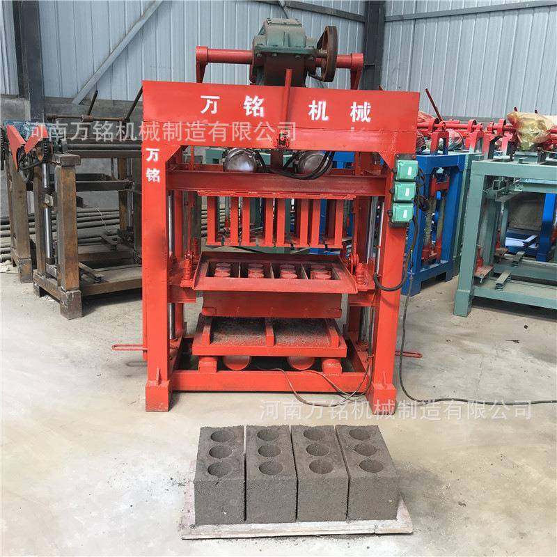 吉尔吉斯坦空心水泥砌块成型机椭圆孔空心砖机免烧水泥制砖机
