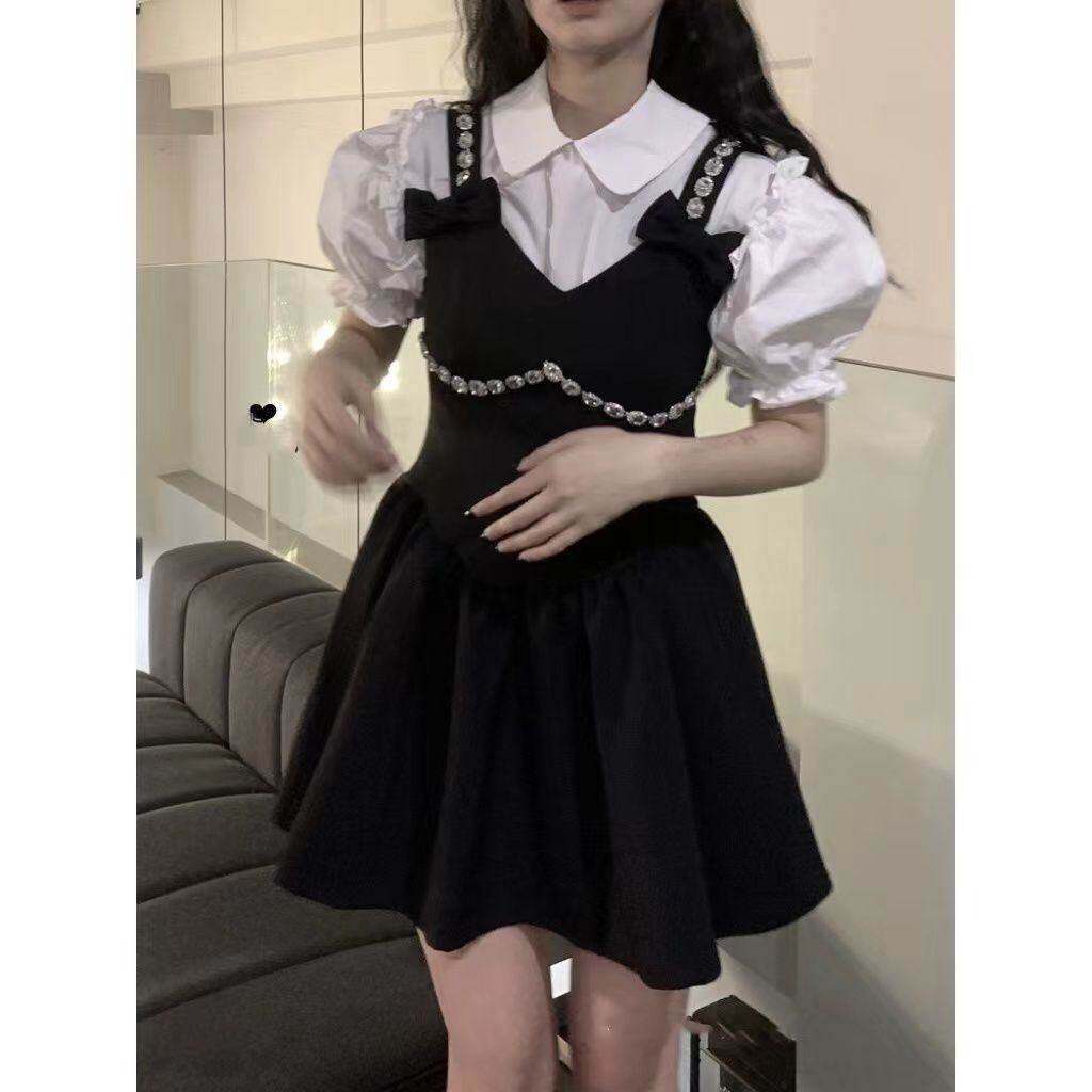 法式蝴蝶结黑色连衣裙女2026年新款夏季小众设计背带裙子字短裙