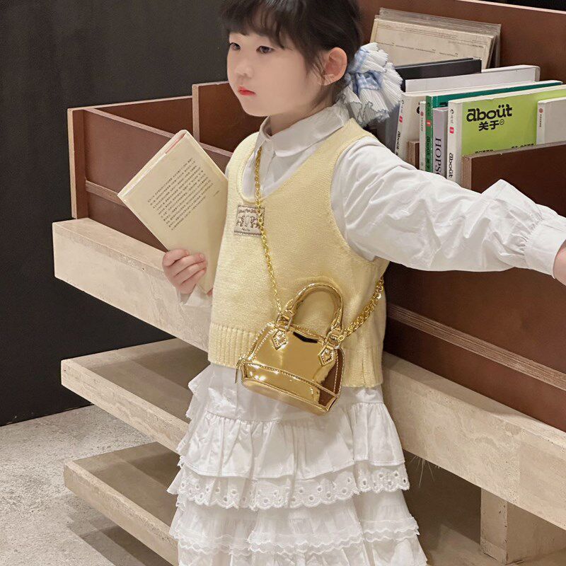儿童镭射亮面迷你斜挎包2025新款小女孩手提包宝宝小众贝壳零钱包