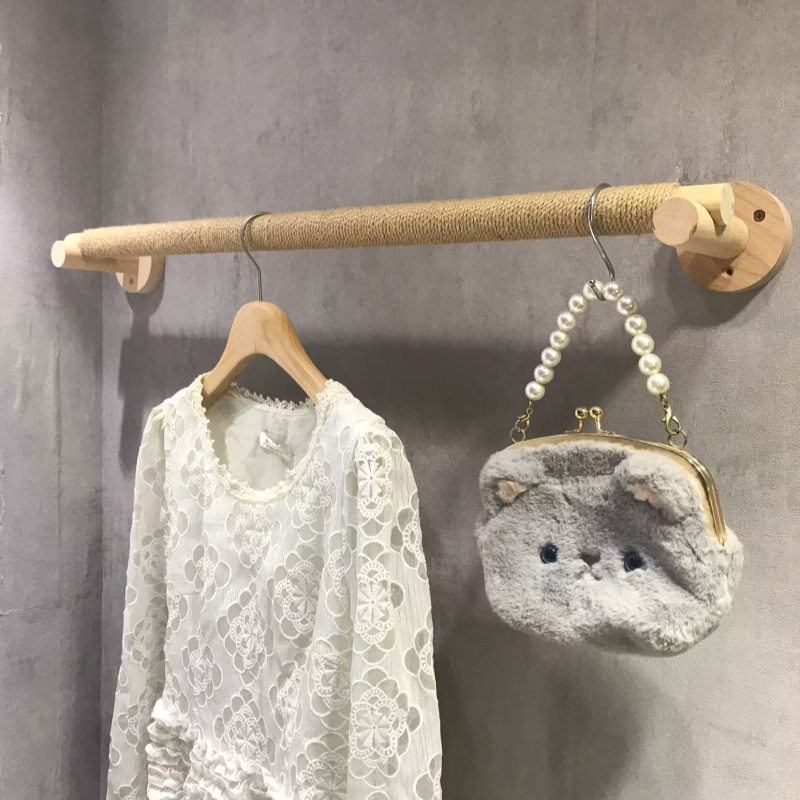服装店上墙壁挂展示架麻绳木棍衣杆正侧挂陈列墙上置衣架童装货架