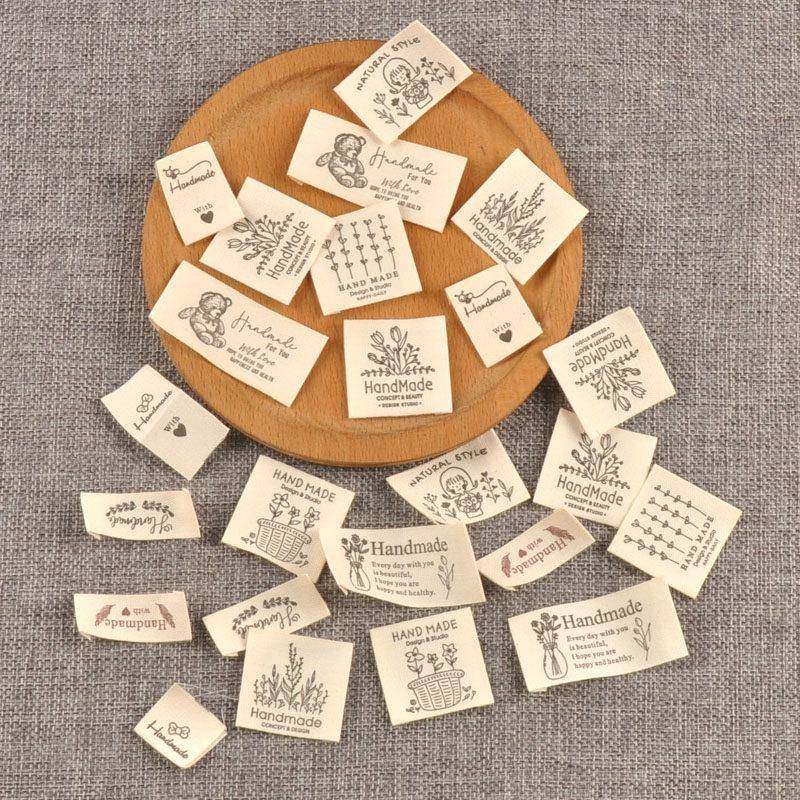 米色标签衣服服装领标手工制作折边布标DIY布贴服饰标签50个,纺织面料/辅料/配套,洗唛/洗涤标/商标,淘宝优惠券,粉丝福利购,淘宝优惠卷