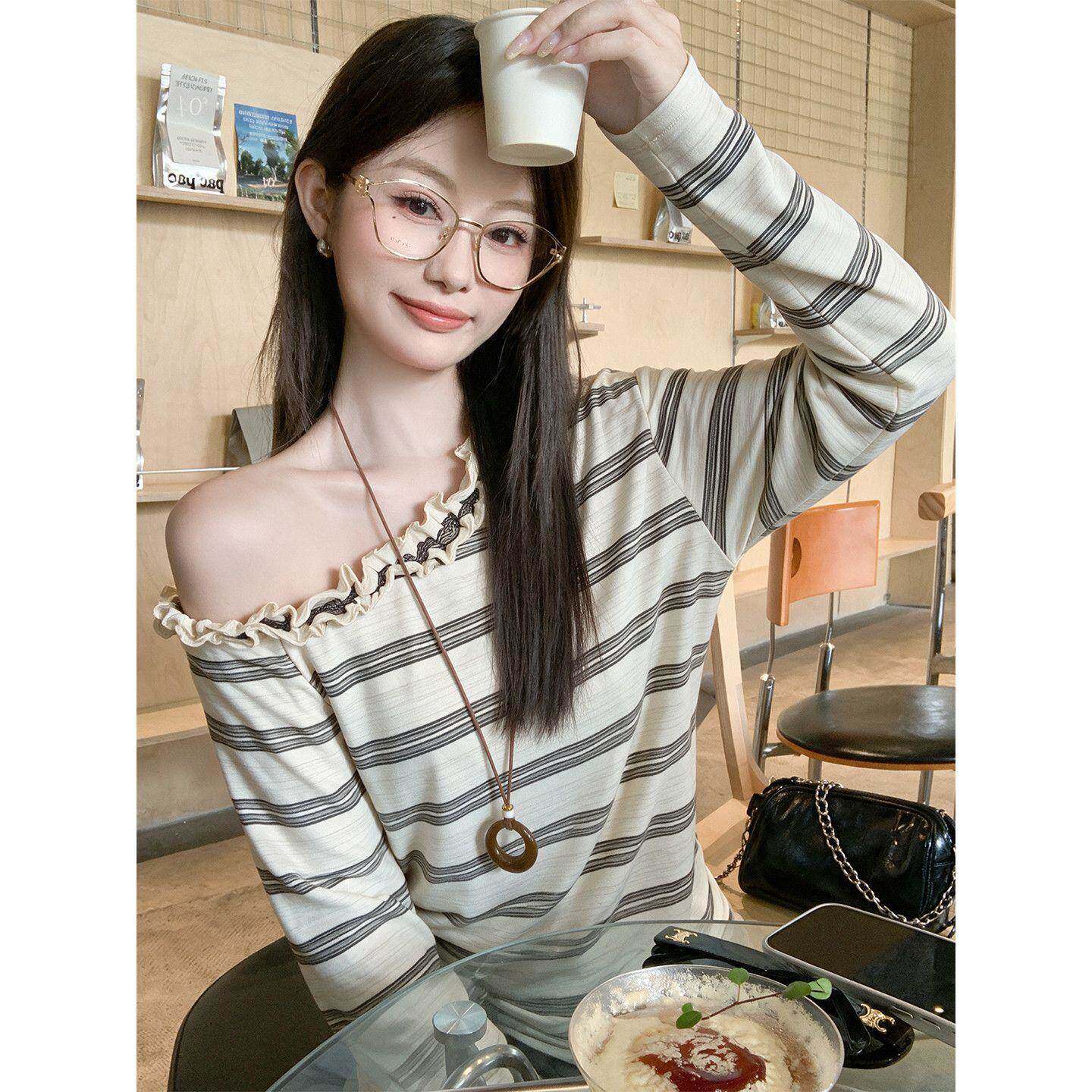 韩系条纹斜肩长袖T恤女秋季修身显瘦木耳边露肩气质上衣