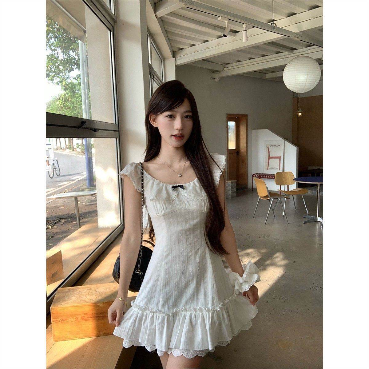 白色娃娃领连衣裙女夏季新款蕾丝花边蝴蝶结漂亮好看收腰A字短裙