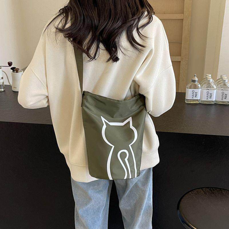 可爱猫咪斜挎包女夏季休闲百搭学图片
