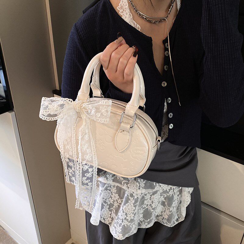甜美可爱蕾丝迷你包包女2025年春夏季新款简约时尚单肩斜挎手拎包