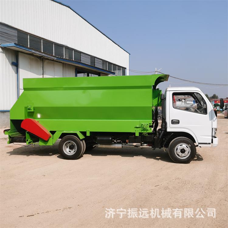 柴油三轮草料喂料机双侧出料5方投草机螺旋输送电动撒料车