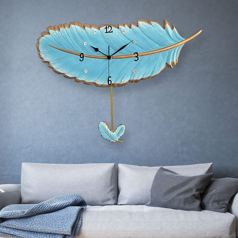 挂钟创意个性静音摇摆家用现代简约轻奢挂墙时钟新款钟表时尚羽毛