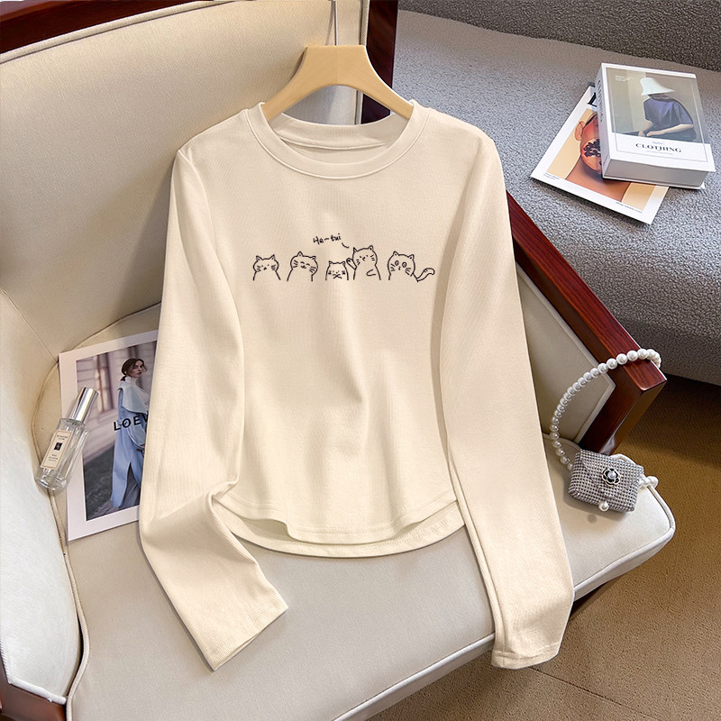 正肩长袖t恤女2026新款春秋奶油色打底衫不规则短款显瘦上衣