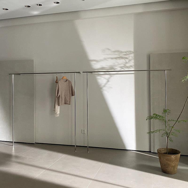 服装店展示架上墙壁挂式不锈钢挂衣服架子女装店专用货架陈列道具