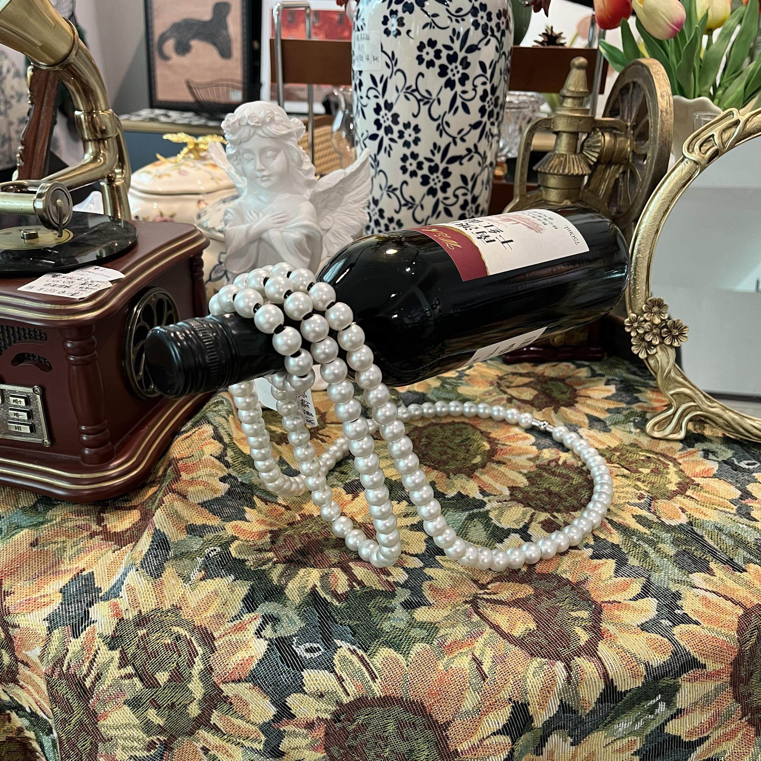 设计师款，珍珠项链悬浮酒架