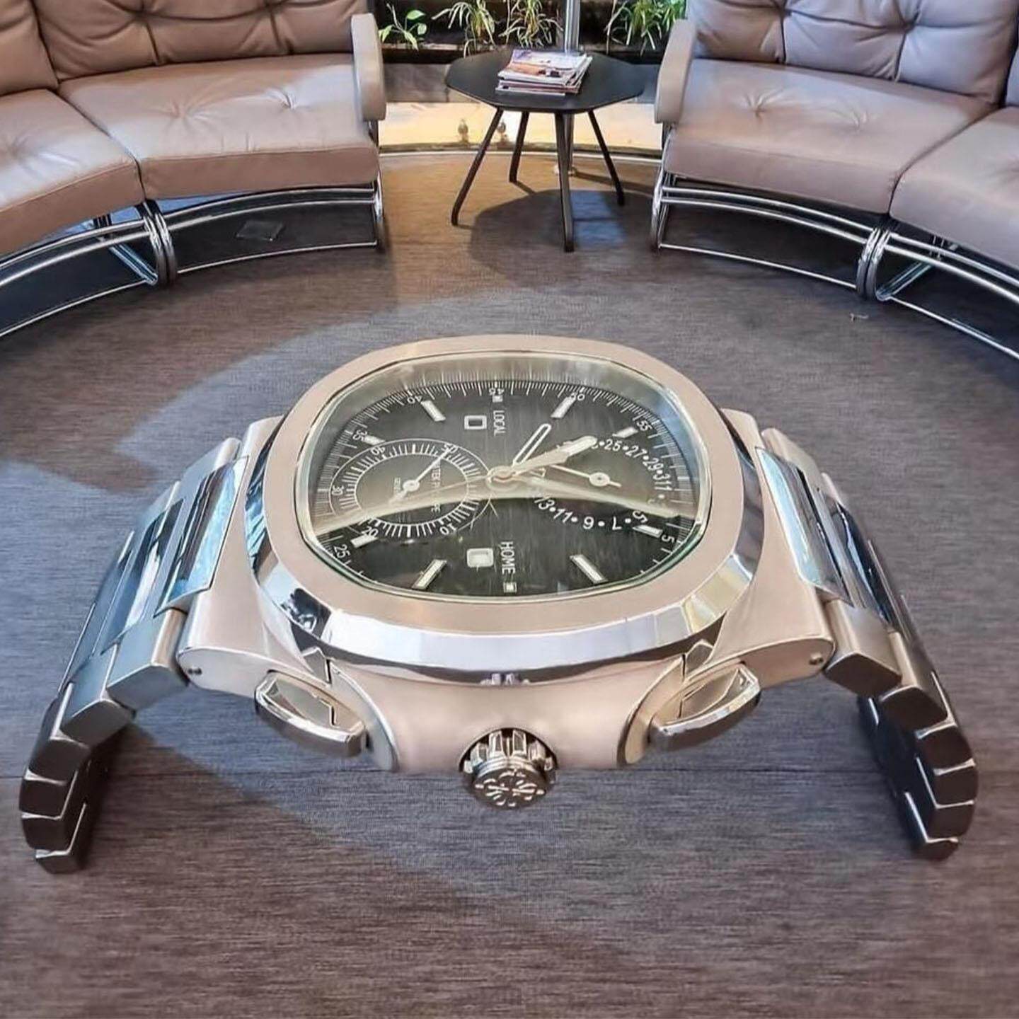 意式轻奢不锈钢创意茶桌设计师款钢化玻璃台面别墅艺术手表茶几