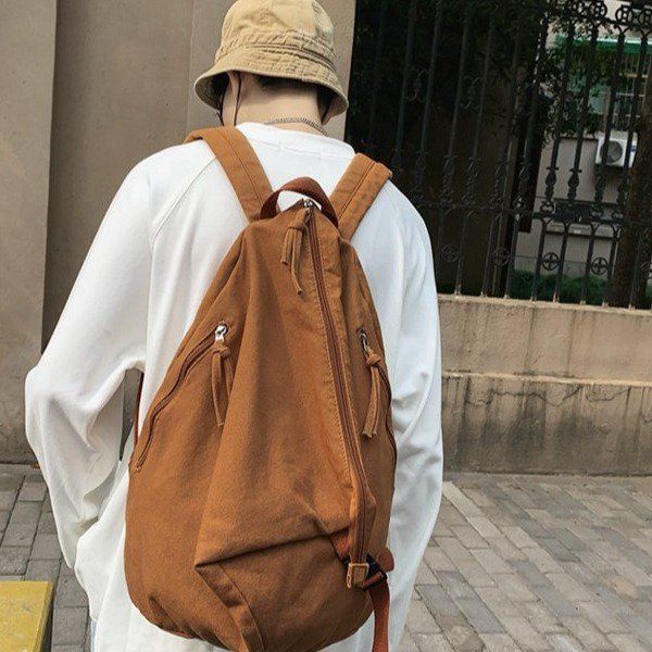 日系个性潮牌书包高中大学生双肩包女时尚休闲纯色水洗帆布背包男