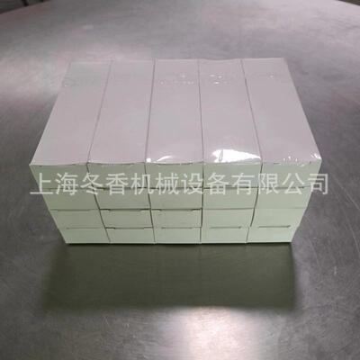 2005型可调式透明膜三维包装机、化妆品薄膜裹包机、智能型烟包机