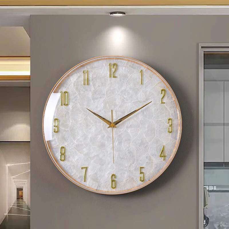 。。轻奢贝壳挂钟2024新款挂表客厅家用钟表现代简约创意大气挂墙