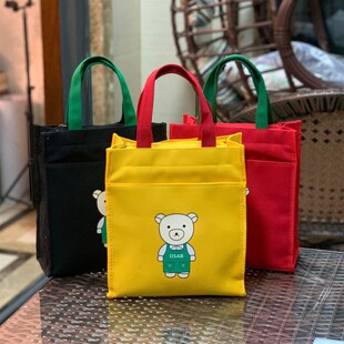 新款帆布内置水杯位男孩女孩便当包补课包饭盒袋补习袋妈妈包