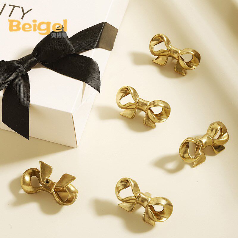 蝴蝶结拉手衣柜柜门把手橱柜把手轻奢黄铜拉手创意柜子法式厨柜