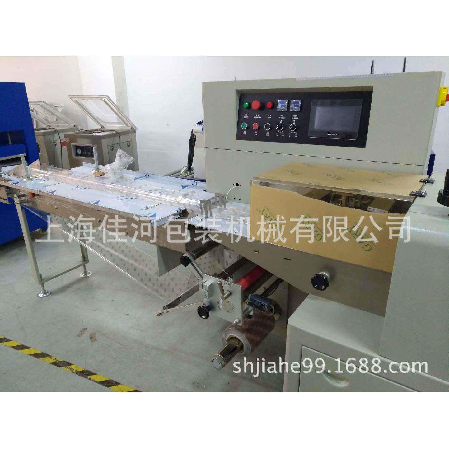 厂家供应一次性医药用品枕式包装机钥匙扣五金制品自动包装机