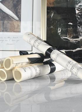 抽象后现代欧式黑色丝带卷轴乐谱琴谱摆件家居样板间饰品台面摆设