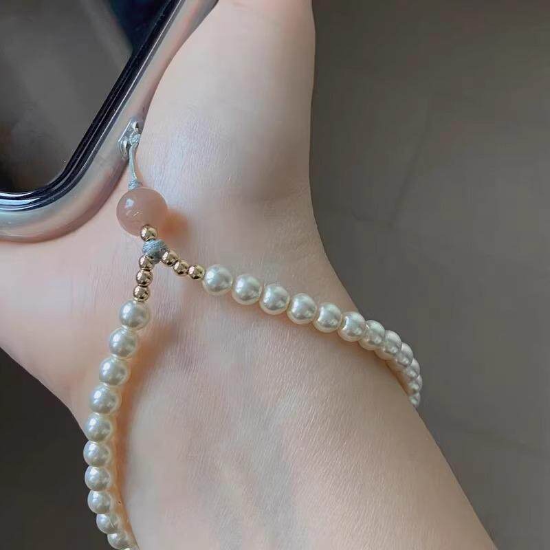 淡水珍珠手机链挂件女串珠手腕绳防太阳石手机挂绳挂件中国风女款
