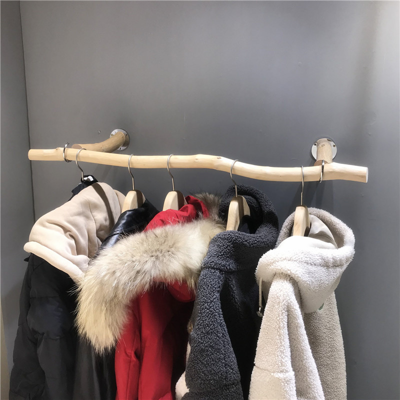 服店展示架上墙天然树枝挂衣杆女陈列墙上置衣架壁挂童货架