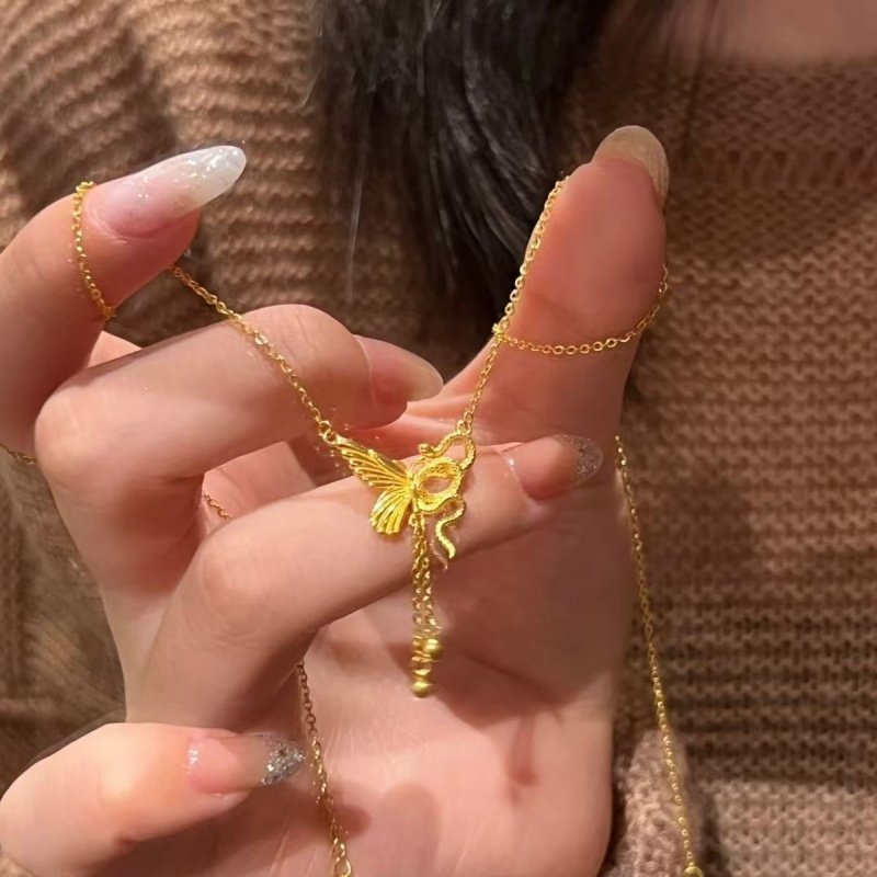 黄金色缠绕灵蛇与蝴蝶流苏项链女款不对称蛇蝶伴生锁骨颈链毛衣链