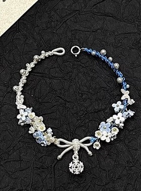 「逐冬春日」雪花蝴蝶结编织手链2025新款新中式精致蓝白撞色手绳
