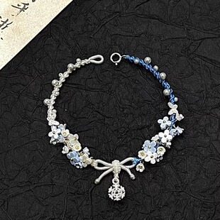 「逐冬春日」雪花蝴蝶结编织手链2025新款新中式精致蓝白撞色手绳