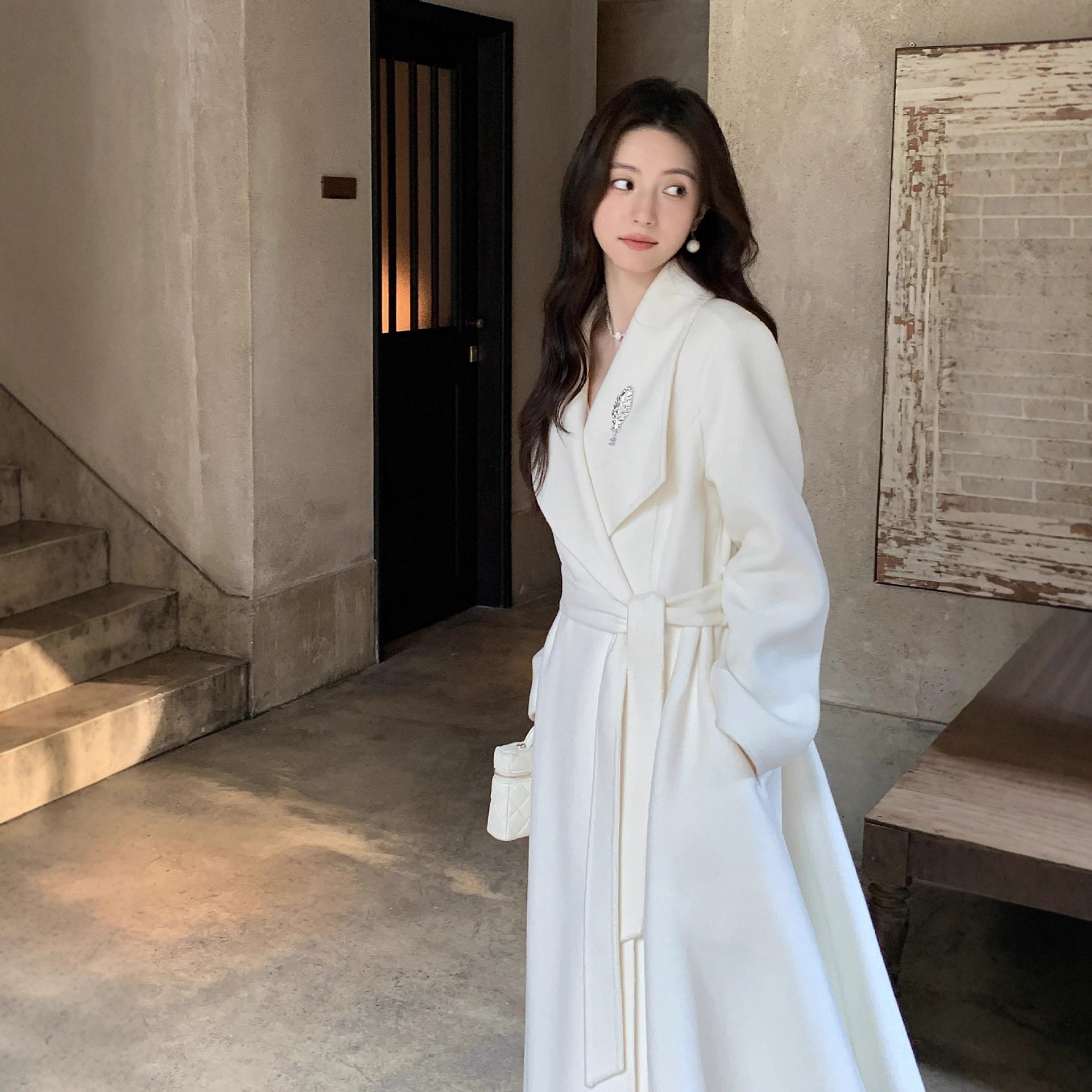 高级感白色羊绒大衣女装中长款2025年冬季收腰裙摆双面呢羊毛外套