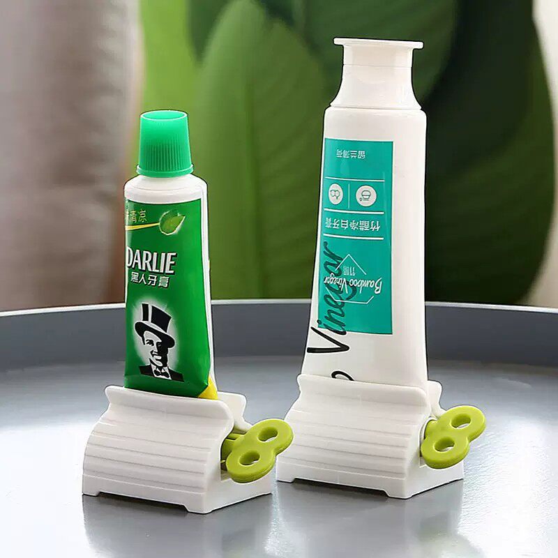 洗面奶手动护手霜自动挤牙膏神器