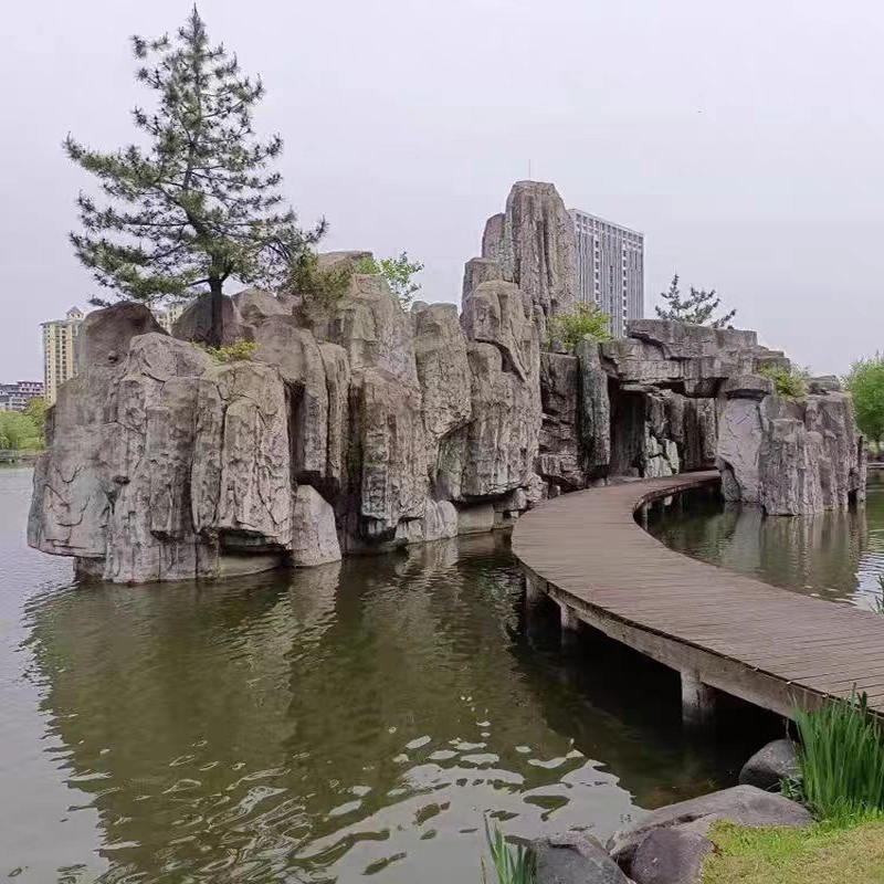 大型户外水泥假山假树塑石门头栏杆溶洞游乐园影视造景景观雕塑