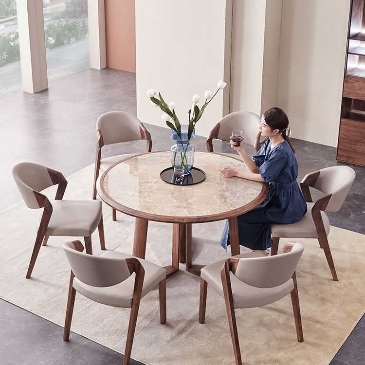 北美黑胡桃木岩板餐桌意式轻奢设计师创意实木圆型饭桌高端圆桌子