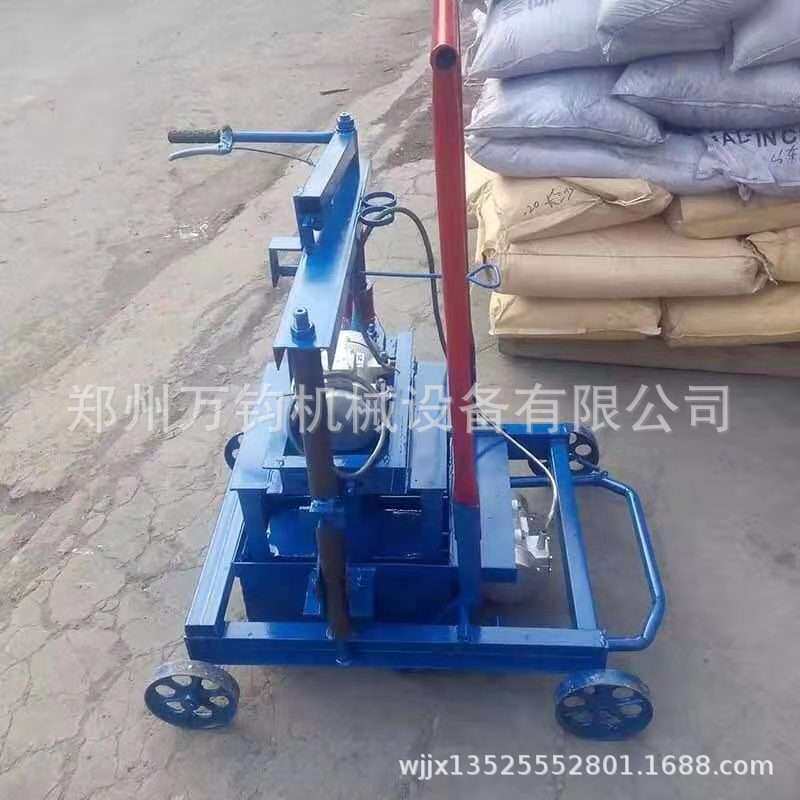 万钧小型移动水泥砖机半自动水泥空心砖机铺路砖垫块路沿石砖机
