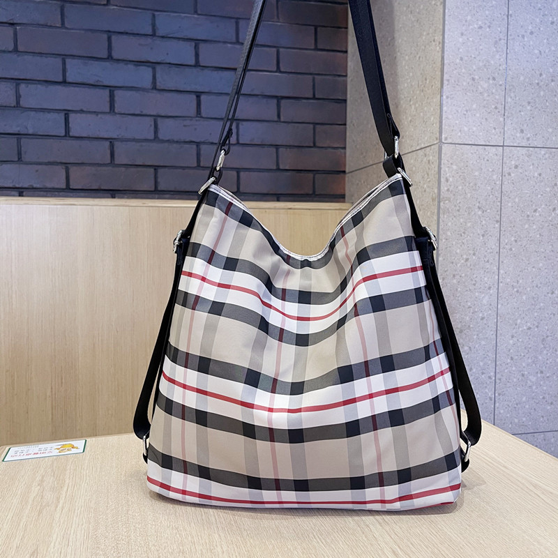 日韩单肩包休闲新l款个性时尚斜挎牛津布印花多功能女包大容量双
