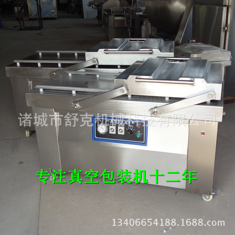 厂家供应麻辣熟食即食鸭翅真空包装机 双室四封条真空包装机摆盖