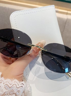 2025无框墨镜女高级感凯旋门复古时尚防晒太阳镜椭圆框金属墨镜男