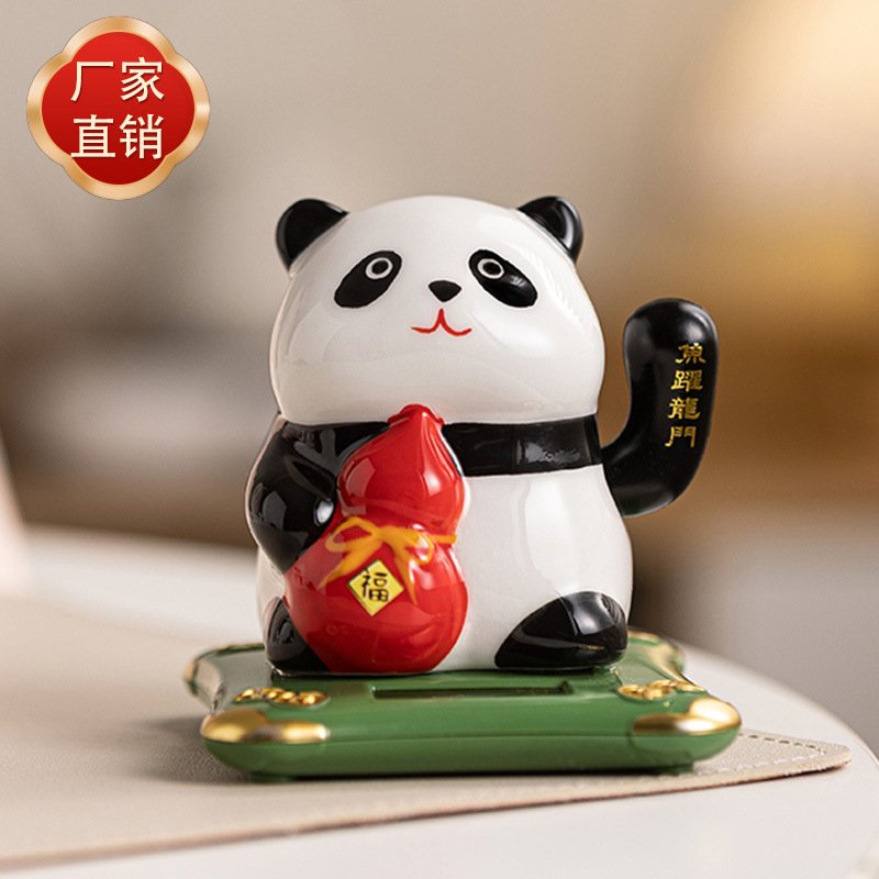 熊猫摇手摆件新款太阳能光感车载前台办公桌面车载中控台可爱国宝