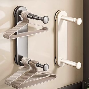 墙上免打孔挂衣架多功能挂钩伸缩家用子吸盘阳台衣架收纳神器壁挂