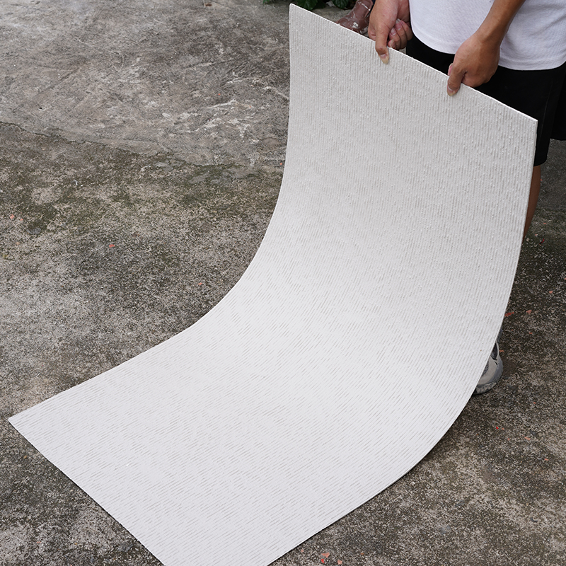 软石布纹石家工装KTV会所电视沙发背景墙软瓷柔T性石材贴弧形包柱