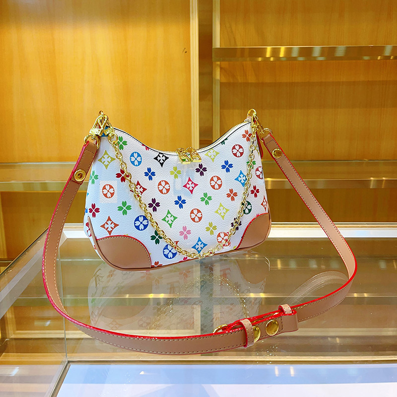 女包2025新款潮流高级感真皮百搭老花牛角包链条单肩腋下包斜挎包