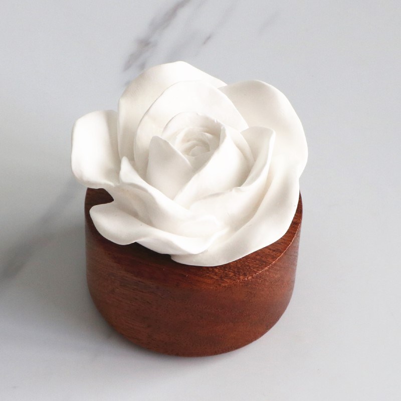 室内香氛精油石创意家居u香薰木底座石膏玫瑰花车载扩香石摆件
