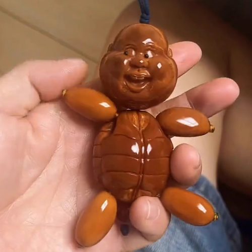 创意网红巴西橄榄雕刻文玩手把件小人搞笑表情有钱小龟仙把玩物件
