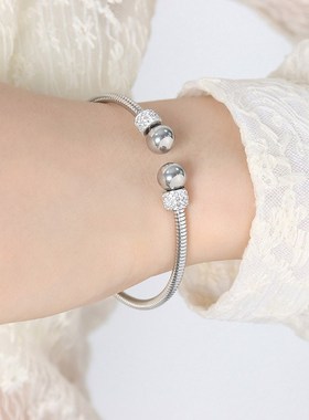 金属时尚通勤个性金色钢色螺纹轻奢风不掉色闪耀T钛钢女生手镯饰