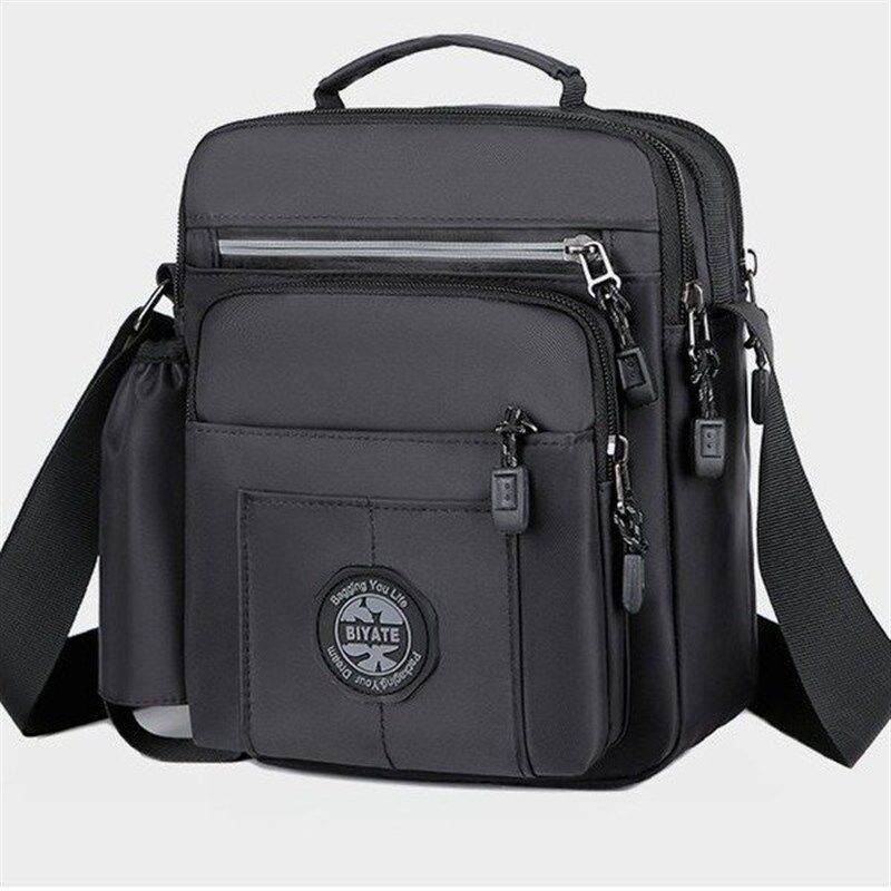 新款男士竖版单肩斜挎包休闲男包多功能潮流手提包防水牛津布包