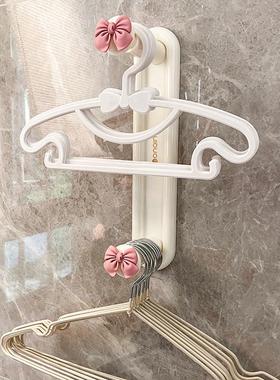 衣架收纳神器免打孔家用晾衣架收纳阳台壁挂伸缩多功能墙上整理架