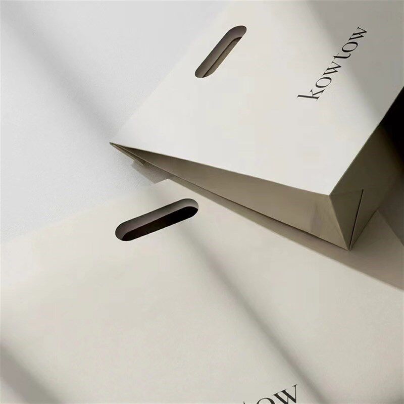 镂空手提a纸袋礼品袋手提纸袋定制印刷logo大小服装纸袋定制